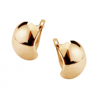 Złote kolczyki na biglu