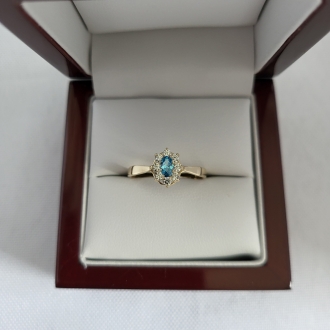 Złoty pierścionek z jasnoniebieską cyrkonią Markiza PM006/T