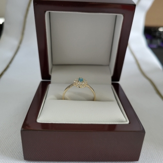 Złoty pierścionek z jasnoniebieską cyrkonią Markiza PM006/T