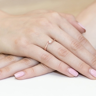 Pierścionek  z różowego złota z brylantem 0.13ct BD160/R