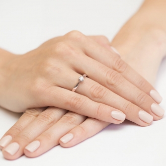 Pierścionek z różowego złota z brylantem 0.15ct BD228/R