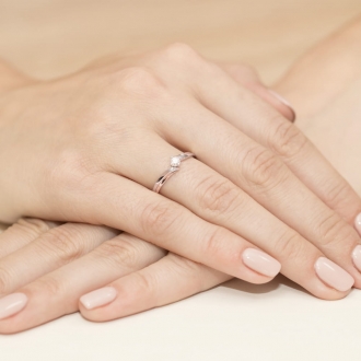 Pierścionek z różowego złota z brylantem 0.10ct BD231/10/R