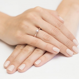 Pierścionek z różowego złota z brylantem 0.12ct BD295/R