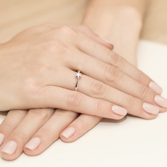 Pierścionek z różowego złota z brylantem 0.12ct BD299/R