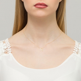 Złota zawieszka mała literka N z brylantem 0,005ct ZBD069N