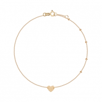 Subtelna złota bransoletka na nogę z serduszkiem