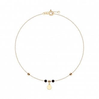 Złota bransoletka na nogę z czarnymi cyrkoniami